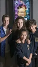  ?? CATHIE COWARD, THE HAMILTON SPECTATOR ?? Clockwise from left, Isaac Kragten, Olivia Presti, Jaiden Cannatelli and Michela Luci are in the new “Odd Squad: The movie” that opened Saturday morning.