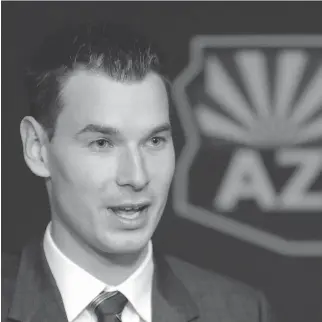  ?? MATT YORK/THE ASSOCIATED PRESS ?? John Chayka of the Arizona Coyotes, the youngest general manager in the NHL, found a kindred spirit in former Toronto Blue Jays GM Alex Anthopoulo­s.