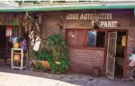  ??  ?? Far Left: The front of Mama Shabalala’s clinic located next to an automotive spare shop at the Mai Mai market.
Left: The pharmacy's shelves. Herbs, dried animal body parts and concotions to heal from any illness are on sale here. If it can be used as...