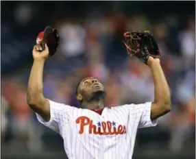  ?? DERIK HAMILTON — THE ASSOCIATED PRESS ?? Hector Neris reacts after closing out the Phillies’ 6-1 victory over the Milwaukee Brewers on Friday.