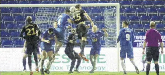  ?? (Photo: AP) ?? West Ham’s Craig Dawson (#15) scores his side’s goal during the English FA Cup third-round soccer match between Stockport County and West Ham United at Edgeley Park in Stockport, England, yesterday.