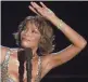  ?? MARK J. TERRILL/ASSOCIATED PRESS ?? Whitney Houston (seen in 2000) “helped me find my voice,” Rashidra Scott says.