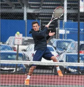  ?? AUSTIN HERTZOG - DIGITAL FIRST MEDIA ?? Spring-Ford’s Nolan Schweitzer hits a forehand against Phoenixvil­le’s JT Stevens at No. 2 singles Thursday.