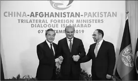  ??  ?? Chinese State Councilor and Foreign Minister Wang Yi (L), Pakistani Foreign Minister Shah Mahmood Qureshi (C) and Afghan Foreign Minister Salahuddin Rabbani attend the 3rd China-Afghanista­n-Pakistan Foreign Ministers’ Dialogue in Islamabad, capital of Pakistan, Sept. 7, 2019. (Xinhua)