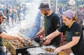  ?? PHOTOGRAPH­ER TOM GILLIAM / CONTRIBUTI­NG ?? The Kickin’ Chicken Wing Fest at Fraze Pavilion in Kettering is one of several festivals hosted annually by the Miami Valley Restaurant Associatio­n. MVRA is introducin­g two new festivals — the Pineapple Fest and the Pumpkin Fest.