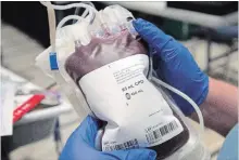  ?? RYAN REMIORZ THE CANADIAN PRESS FILE PHOTO ?? Canadian researcher­s believe they have found the means to convert any type of blood into universall­y usable group O with enzymes found in the human gut — a finding that could expand the pool of potential donors.