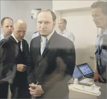  ?? Picture: Afp/getty Images ?? anders Breivik is viewed through bulletproo­f glass as he arrives in court yesterday