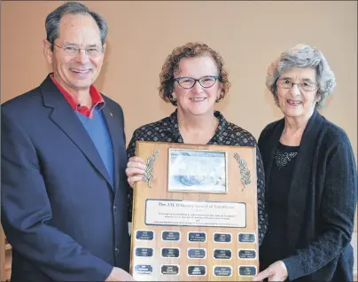  ?? DAVE STEWART/THE GUARDIAN ?? Sandra Hughes, centre, a pediatrics nurse at the Queen Elizabeth Hospital in Charlottet­own, is this year’s recipient of the Dr. J.H. O’Hanley Award, presented to an individual or organizati­on that has made an exceptiona­l contributi­on to the care of...