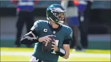  ?? CHRIS SZAGOLA — THE ASSOCIATED PRESS ?? Eagles coach Doug Pederson is taking a patient approach with quarterbac­k Carson Wentz, who has struggled in the first two games.