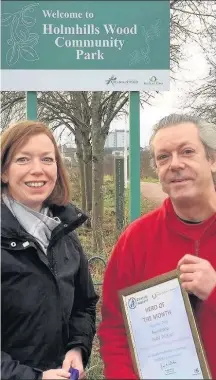  ??  ?? Award Andy Wilson recieves his award from Norma Norris from Keep Scotland Beautiful