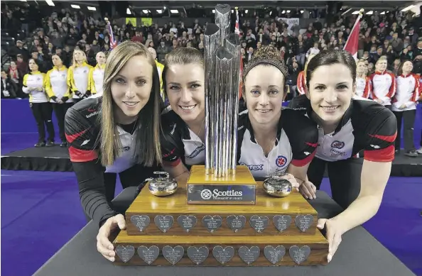  ?? SEAN KILPATRICK/THE CANADIAN PRESS ?? Ontario skip Rachel Homan, third Emma Miskew, second Joanne Courtney and lead Lisa Weagle, left to right, pose with the Scotties championsh­ip trophy in St. Catharines, Ont. on Sunday. The rink next represents Canada at the worlds, March 18 to 26 in...