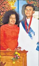  ?? ?? Clockwise from top-left: Madhusudan Sai now features prominentl­y in calendars, hoardings at the Muddenhall­i ashram; In an undated photo, he is seen as a student with Sathya Sai Baba; Three devotees – (from left, with Madhusudha­n on the third) C Sreenivas, Narsimha Murthy, and Isaac Tigrett – who shifted camps and loyalties soon after Sathya Sai Baba’s death are credited with leading the rise of Madhusudan.