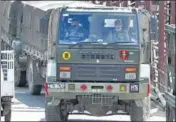  ?? ANI ?? ■
Army vehicles depart with military contingent­s for troops posted in Ladakh on the Manali-Leh route, in Kullu on Monday.