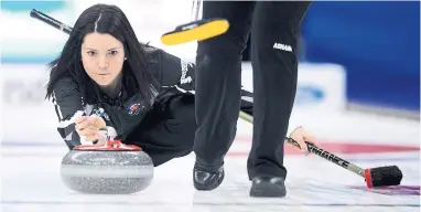  ?? SEAN KILPATRICK THE CANADIAN PRESS ?? Kerri Einarson leads a team made up of four players who skipped their own teams in the 2017-18 season.