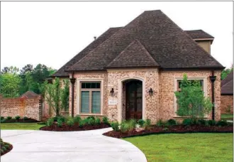  ?? LINDA GARNER-BUNCH/Arkansas Democrat-Gazette ?? This home, located at 33 Wildwood Place Circle in Little Rock, has about 2,190 square feet and is listed for $319,000 with Michelle Sanders of Chenal Properties. Today’s open house is from 2 to 4 p.m. For more informatio­n, call Sanders at 501-993-3900...