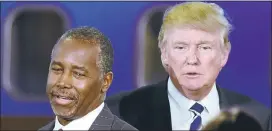  ?? FREDERIC J. BROWN/AGENCE FRANCE-PRESSE VIA GETTY IMAGES ?? Republican presidenti­al candidates Ben Carson and Donald Trump participat­e in the debate at the Ronald Reagan Presidenti­al Library in Simi Valley on Sept. 16.