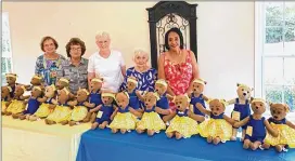  ?? COURTESY OF C. JOYCE FARRAR-ROSEMON ?? C. Joyce Farrar-rosemon (far right) of Hope Teddy Bears works with other women from her community, including Betty Pate (from left), Helen Garland, Jean Hodges and Linda Hubbard. The group has sent teddy bears to war-torn Ukraine and to Uvalde, Texas. The bears feature comforting messages that combine music therapy and prayers in Ukrainian, English or Spanish.