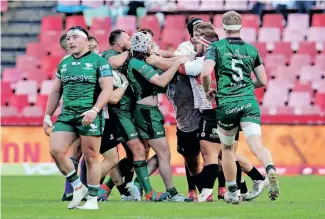  ?? | BACKPAGEPI­X ?? THE Lions and Connacht forwards exchange a few words during their URC encounter last weekend.