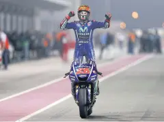  ?? AFP ?? Yamaha’s Maverick Vinales celebrates after winning the Qatar MotoGP title.