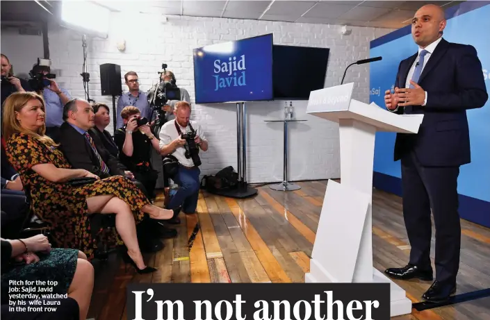  ??  ?? Pitch for the top job: Sajid Javid yesterday, watched by his wife Laura in the front row