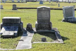  ?? Photos by Jim Magill ?? Fallen headstones and monuments in need of shoring up can be found throughout Humble Cemetery. The city will spend about $10,000 annually to restore and improve the grounds.