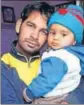  ?? HT FILE ?? Naik Hari Singh with his son Lakshya at his native village Rajgarh in Rewari district.