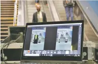  ?? AP PHOTO ?? A scanner reveals a suspicious object on a man, left, during a Transporta­tion Security Administra­tion demonstrat­ion in New York’s Penn Station. Los Angeles is poised to have the first mass transit system in the U.S. with body scanners.
