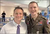  ?? Adam Carey ?? Armuchee High School’s newly appointed principal, Joseph Pethel, and Lt. Col. Chip Cox, both AHS grads, pose together Thursday during Bridge Day activities.