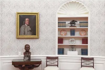  ?? ALEX BRANDON/ASSOCIATED PRESS ?? The Oval Office of the White House is newly redecorate­d for the first day of President Joe Biden’s administra­tion. On the top shelf of the bookcase sits “Swift Messenger” by Santa Fe sculptor Allan Houser.