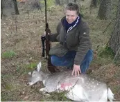  ??  ?? ABOVE: Author with the ewe.
BELOW: German hunting tradition of placing leaves in the animal’s mouth.