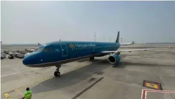  ?? VNA/VNS Photo ?? A Vietnam Airlines plane at Soekarno-hatta internatio­nal Airport. The flag carrier posted a gain in profit in the first quarter after long period of losses.