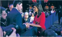  ?? MAANSI SRIVASTAVA­THE NEW YORK TIMES ?? Nikki Haley greets attendees at a town hall event in Des Moines, Iowa, on Monday. Two new polls in New Hampshire show the Republican race narrowing in the state.