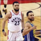  ?? CHRIS YOUNG — THE CANADIAN PRESS VIA AP ?? Golden State Warriors’ Stephen Curry, right, celebrates in front of Toronto Raptors’ Fred VanVleet at the final buzzer as the Warriors beat the Raptors 106-105 in Game 5 of the NBA Finals in Toronto on Monday.