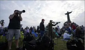  ?? Eric Gay/Associated Press ?? People gather Thursday to watch SpaceX's mega rocket Starship launch its third test flight from Starbase in Boca Chica, Texas.