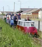  ?? CLIFF THOMAS ?? The 15in gauge shuttle heads back to Fairbourne station on May 28, during Fairbourne Railway’s steam and diesel gala. Leading the consist is the Sutton collection Railcar, behind which is resident Lister
Auto Truck Gwril. On the far end of the shuttle is Rhyl Miniature Railway’s visiting 4-4-2 Prince Edward of Wales.