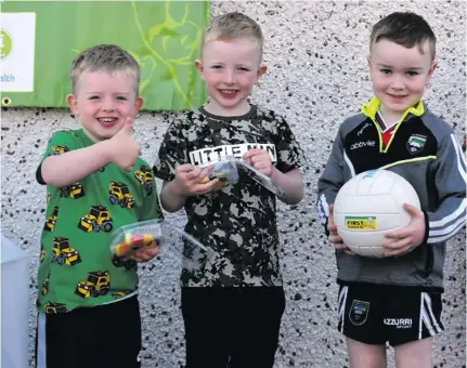  ??  ?? Killian and Lucas Marren and Seán Kennedy at the Healthy Club launch at Curry GAA Club.