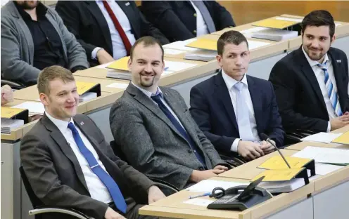  ?? Foto: imago/Christian Schroedter ?? Wie aus anderen Zeiten – die AfD vereint im Magdeburge­r Landtag: André Poggenburg, Daniel Roi, Matthias Büttner, Tobias Rausch (v.l.)