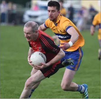  ??  ?? Rathkenny veteran Donal Curtis is tracked by Seneschals­town’s John Smith.