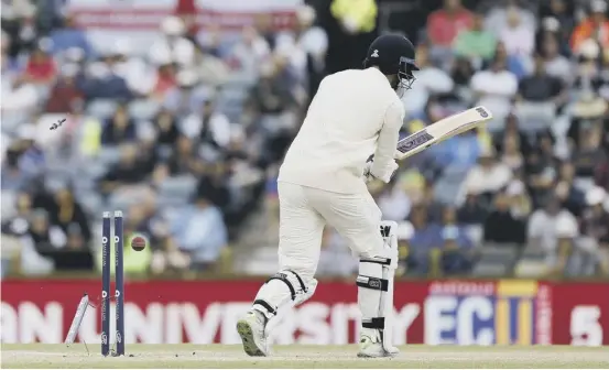  ??  ?? 2 England’s James Vince has his off-stump removed by a Mitchell Starc delivery after making an entertaini­ng half-century in England’s battle to stay in with a chance of retaining the Ashes.