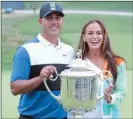  ?? (USA TODAY SPORTS) ?? Brooks Koepka and his girlfriend Jena Sims pose with the Wanamaker Trophy.