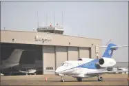  ?? Brian A. Pounds / Hearst Connecticu­t Media ?? A private charter jet managed by Gama Aviation sits outside Volo Aviation at Sikorsky Airport in Stratford on Aug. 29.