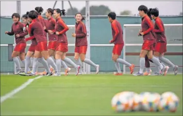  ??  ?? La selección de China en un entrenamie­nto antes de surgir el problema del coronaviru­s.