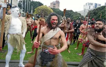  ?? ROSS GIBLIN/STUFF ?? Protesters outside Parliament in Wellington show their support for Auckland iwi Nga¯ti Wha¯tua in its case before the Supreme Court.