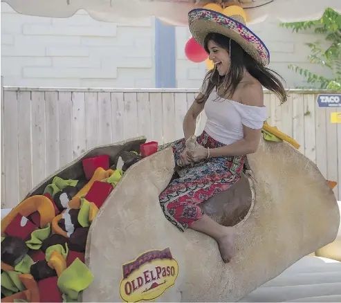  ??  ?? In addition to well-staffed bars and a mariachi band, Toronto Taco Fest included a mechanical bull dressed as a taco.