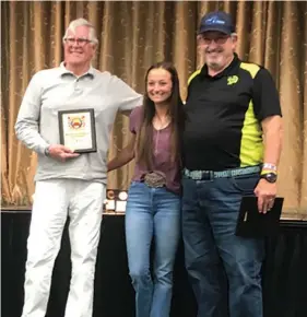  ?? ?? Bill (left) and Bob celebrate their NORC 100mph class win at the awards banquet with trophy presenter Maggie Wines, Ely’s White Pines High School Senior Class President.
