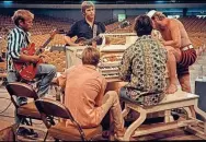  ?? PHOTOS PROVIDED BY GENESIS PUBLICATIO­NS ?? The Beach Boys in a rare photo during recording. It’s one of the many previously unreleased images in "The Beach Boys" book from the band.