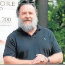  ??  ?? Russel Crowe, con un aspecto irreconoci­ble y unos kilos de más.