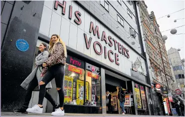  ?? Picture: GETTY ?? BURDEN: Businesses like HMV are facing online competitio­n, high rates and charges