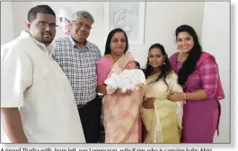  ??  ?? A proud Thatha with, from left, son Logesvaran, wife Rajes who is carrying baby Ahiri, daughter-in-law Shanta and daughter Saranya.