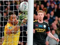  ?? AFP ?? Upright Citizens: City breathe a sigh of relief as Bravo pushes Engels’ late header onto a post